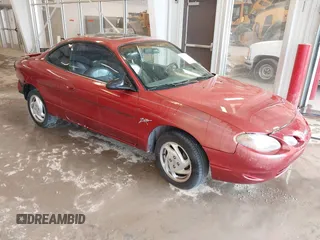 2000 Ford Escort ZX2 with VIN 3FAKP1133YR124283, listed as a IAAI auction lot 41210679 with 217,629 mi miles. Bid and sale history available at carsss.com. Image 1.