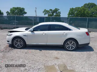 2015 Ford Taurus Limited with VIN 1FAHP2F88FG171835, listed as a IAAI auction lot 42370656 with 152,210 mi miles and . Bid and sale history available at DreamBid. Image 14.