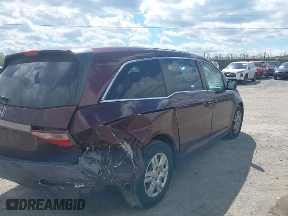 2013 Honda Odyssey LX with VIN 5FNRL5H28DB058401, listed as a IAAI auction lot 42050892 with 221,016 mi miles and . Bid and sale history available at carsss.com. Image 6.