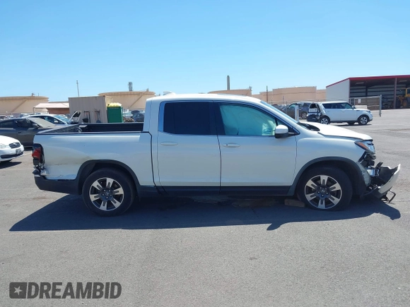 2019 Honda Ridgeline RTL with VIN 5FPYK2F52KB004624, listed as a IAAI auction lot 41789190 with 51,834 mi miles and . Bid and sale history available at DreamBid. Image 13.