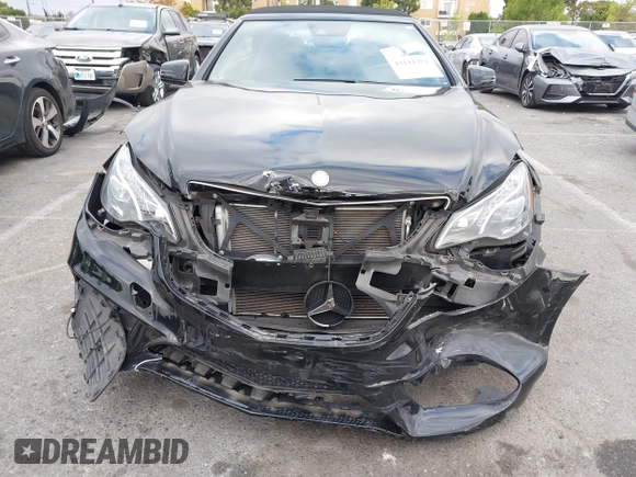 2016 Mercedes-Benz E E 400 with VIN WDDKK6FF7GF339417, listed as a IAAI auction lot 42111352 with 59,859 mi miles. Bid and sale history available at carsss.com. Image 12.