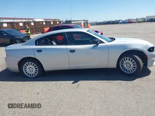 2019 Dodge Charger Police with VIN 2C3CDXKT4KH647831, listed as a IAAI auction lot 41976021 with 35,515 mi miles and . Bid and sale history available at DreamBid. Image 13.