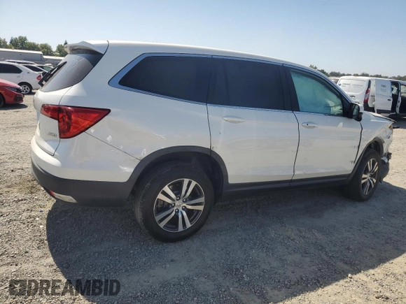 2018 Honda Pilot EX-L with VIN 5FNYF6H54JB013986, listed as a Copart auction lot 60743165 with 124,373 mi miles and Salvage title. Bid and sale history available at DreamBid. Image 3.