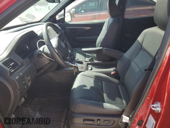 2023 Honda Passport EX-L with VIN 5FNYF8H57PB007264, listed as a Copart auction lot 48942955 with 18,013 mi miles and Salvage Title. Bid and sale history available at DreamBid. Image 7.