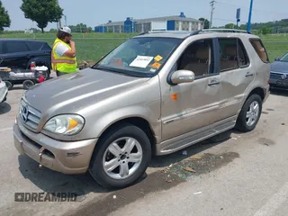 2005 Mercedes-Benz M 350 with VIN 4JGAB57E75A557255, listed as a IAAI auction lot 42443892 with 199,968 mi miles and . Bid and sale history available at DreamBid. Image 2.