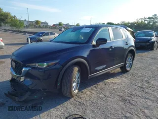 2023 Mazda CX-5 2.5 S Select Package with VIN JM3KFBBM1P0284887, listed as a IAAI auction lot 41910092 with 2,616 mi miles. Bid and sale history available at carsss.com. Image 20.