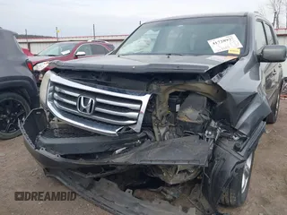 2013 Honda Pilot EX-L with VIN 5FNYF4H74DB041569, listed as a IAAI auction lot 41728937 with 223,355 mi miles and . Bid and sale history available at DreamBid. Image 6.