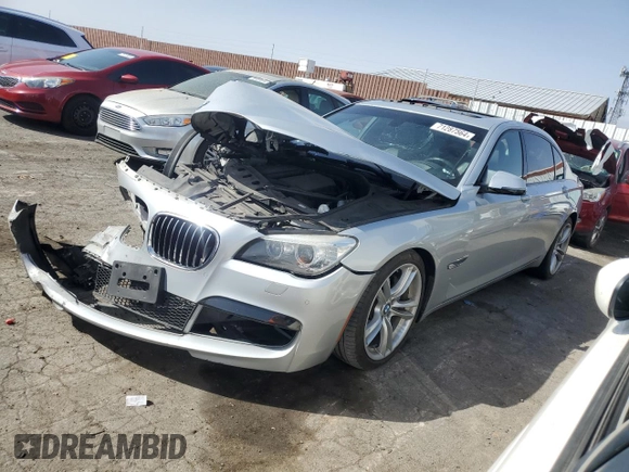 2015 BMW 7 Series 740Li with VIN WBAYE4C52FD947168, listed as a Copart auction lot 71287564 with 103,444 mi miles and Salvage Title. Bid and sale history available at DreamBid. Image 1.