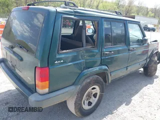 1999 Jeep Cherokee Sport with VIN 1J4FF68S7XL538831, listed as a IAAI auction lot 42101903 with 255,734 mi miles and . Bid and sale history available at DreamBid. Image 4.