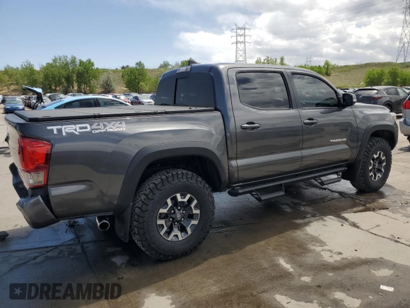 2017 Toyota Tacoma SR5 z VIN 3TMCZ5AN6HM060416, wystawiony jako Copart lot #56697175 z przebiegiem 120 029 mil mil oraz Szkoda całkowita • Salvage title. Historia ofert i sprzedaży dostępna na DreamBid. Obrazek 3.
