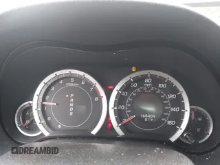 2009 Acura TSX with VIN JH4CU266X9C007198, listed as a IAAI auction lot 42535076 with 168,409 mi miles and . Bid and sale history available at DreamBid. Image 7.