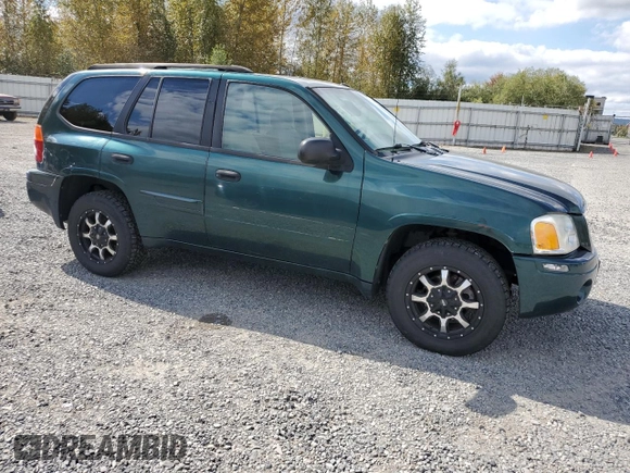 2005 GMC Envoy SLT with VIN 1GKDT13S952144349, listed as a Copart auction lot 71800694 with 137,614 mi miles and Salvage Title. Bid and sale history available at DreamBid. Image 4.
