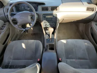 2001 Toyota Camry CE z VIN 4T1BG22K91U116124, wystawiony jako Copart lot #83041984 z przebiegiem 141 101 mil mil oraz Czysty tytuł • Clean title. Historia ofert i sprzedaży dostępna na DreamBid. Obrazek 8.