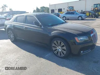 2014 Chrysler 300 with VIN 2C3CCABG8EH136307, listed as a IAAI auction lot 41850615 with 139,928 mi miles. Bid and sale history available at carsss.com. Image 1.