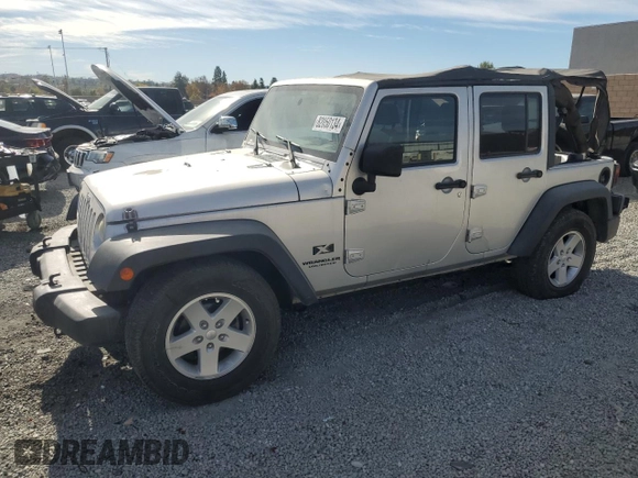 2007 Jeep Wrangler Unlimited X with VIN 1J8GB39157L142982, listed as a Copart auction lot 82050134 with 72,666 mi miles and Salvage Title. Bid and sale history available at DreamBid. Image 1.