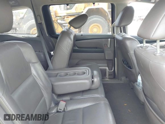 2012 Honda Odyssey EX-L with VIN 5FNRL5H63CB037697, listed as a IAAI auction lot 42262596 with 135,218 mi miles and . Bid and sale history available at DreamBid. Image 8.