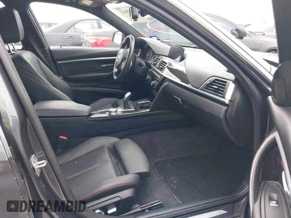 2018 BMW 3 Series 330i xDrive with VIN WBA8D9C55JEM32703, listed as a IAAI auction lot 42478412 with 79,000 mi miles and . Bid and sale history available at DreamBid. Image 5.
