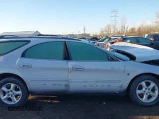 2001 Ford Taurus SE Standard z VIN 1FAFP582X1G268769, wystawiony jako IAAI lot #41837093 z przebiegiem 42 261 mil mil oraz . Historia ofert i sprzedaży dostępna na DreamBid. Obrazek 13.