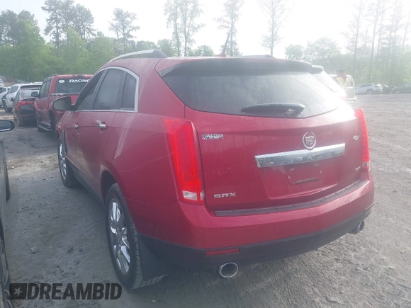 2014 Cadillac SRX Premium Collection with VIN 3GYFNDE36ES564140, listed as a IAAI auction lot 42070008 with 69,768 mi miles and . Bid and sale history available at DreamBid. Image 3.