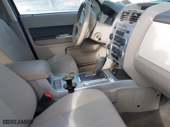 2009 Mercury Mariner with VIN 4M2CU91GX9KJ08073, listed as a IAAI auction lot 41404100 with 90,466 mi miles. Bid and sale history available at carsss.com. Image 5.
