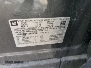 2018 Chevrolet Equinox LT z VIN 3GNAXJEV1JS568768, wystawiony jako Copart lot #57144755 z przebiegiem 93 590 mil mil oraz Szkoda całkowita • Salvage title. Historia ofert i sprzedaży dostępna na DreamBid. Obrazek 13.