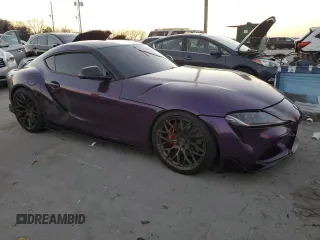 2021 Toyota GR Supra 3.0 with VIN WZ1DB0C00MW042065, listed as a Copart auction lot 83456584 with 36,410 mi miles and Salvage Title. Bid and sale history available at carsss.com. Image 4.