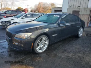 2011 BMW 7 Series 750Li xDrive with VIN WBAKC8C55BC434418, listed as a Copart auction lot 77957584 with 87,595 mi miles and Salvage title. Bid and sale history available at DreamBid. Image 1.