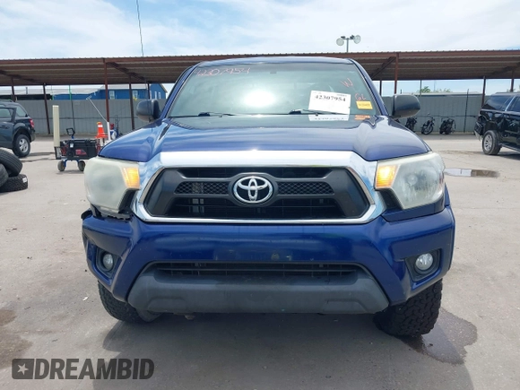 2014 Toyota Tacoma with VIN 3TMLU4EN6EM148851, listed as a IAAI auction lot 42307954 with 71,784 mi miles and . Bid and sale history available at DreamBid. Image 13.