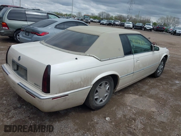 2002 Cadillac Eldorado ESC with VIN 1G6EL12Y92B100940, listed as a IAAI auction lot 42094683 with 146,859 mi miles. Bid and sale history available at carsss.com. Image 4.