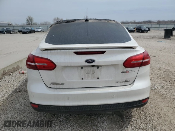 2017 Ford Focus Titanium с VIN 1FADP3J29HL245054, выставлен на аукционе Copart как лот 50784925 с пробегом Не указан миль и На запчасти • Non repairable. История ставок и продаж доступна на DreamBid. Изображение 6.