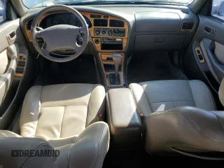 1996 Toyota Camry LE z VIN JT2BF12K3T0139807, wystawiony jako Copart lot #57675855 z przebiegiem 258 601 mil mil oraz Szkoda całkowita • Salvage title. Historia ofert i sprzedaży dostępna na DreamBid. Obrazek 8.