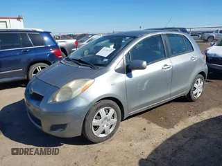 2010 Toyota Yaris with VIN JTDKT4K38A5285260, listed as a IAAI auction lot 41476373 with 104,358 mi miles. Bid and sale history available at carsss.com. Image 2.