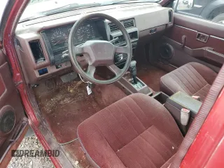 1993 Nissan Hardbody z VIN 1N6HD16S0PC319877, wystawiony jako Copart lot #50015745 z przebiegiem 162 441 mil mil oraz Szkoda całkowita • Salvage title. Historia ofert i sprzedaży dostępna na DreamBid. Obrazek 8.