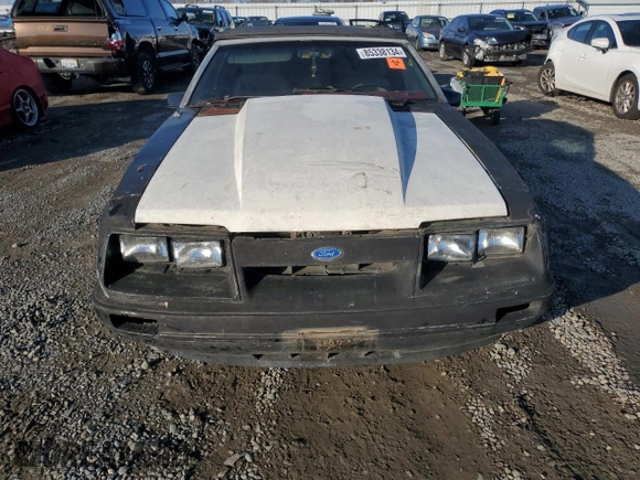 1986 Ford Mustang with VIN 1FABP27M7GF296902, listed as a Copart auction lot 85338134 with 31,829 mi miles and Clean title. Bid and sale history available at DreamBid. Image 5.
