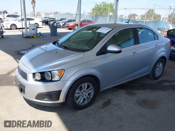 2013 Chevrolet Sonic LT with VIN 1G1JC5SB2D4243632, listed as a IAAI auction lot 42072421 with 40,289 mi miles and . Bid and sale history available at DreamBid. Image 2.