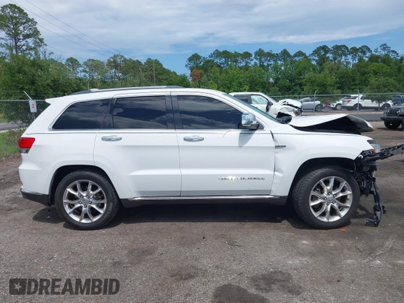 2014 Jeep Grand Cherokee Summit with VIN 1C4RJFJT6EC281114, listed as a IAAI auction lot 42497582 with 128,181 mi miles and . Bid and sale history available at DreamBid. Image 13.