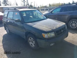 1999 Subaru Forester L with VIN JF1SF6351XH716957, listed as a IAAI auction lot 41969521 with 253,696 mi miles. Bid and sale history available at carsss.com. Image 1.