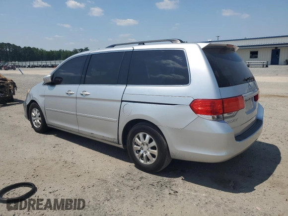 2010 Honda Odyssey EX with VIN 5FNRL3H47AB022393, listed as a Copart auction lot 61956845 with 317,023 mi miles and Salvage title. Bid and sale history available at DreamBid. Image 2.