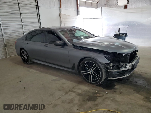 2017 BMW 7 Series 750i with VIN WBA7F0C31HGM22359, listed as a Copart auction lot 56306875 with 90,642 mi miles and Salvage title. Bid and sale history available at DreamBid. Image 4.