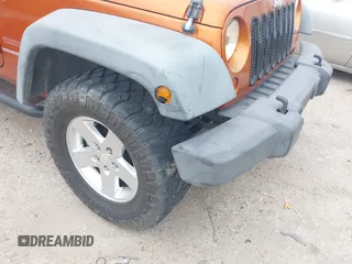 2011 Jeep Wrangler Sport with VIN 1J4AA2D1XBL579882, listed as a IAAI auction lot 42122353 with 153,885 mi miles and . Bid and sale history available at carsss.com. Image 6.