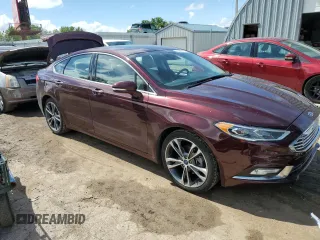 2017 Ford Fusion Titanium with VIN 3FA6P0D95HR208813, listed as a Copart auction lot 60832915 with 62,920 mi miles and Salvage title. Bid and sale history available at DreamBid. Image 4.
