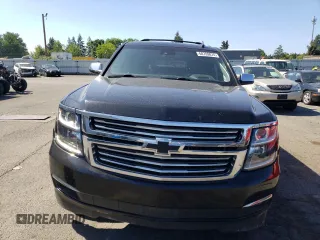 2019 Chevrolet Suburban Premier with VIN 1GNSKJKJ1KR151983, listed as a Copart auction lot 68709074 with 86,611 mi miles and Salvage Title. Bid and sale history available at DreamBid. Image 5.