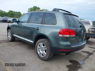 2004 Volkswagen Touareg with VIN WVGCM77L14D045663, listed as a IAAI auction lot 42170895 with 96,709 mi miles and . Bid and sale history available at DreamBid. Image 3.