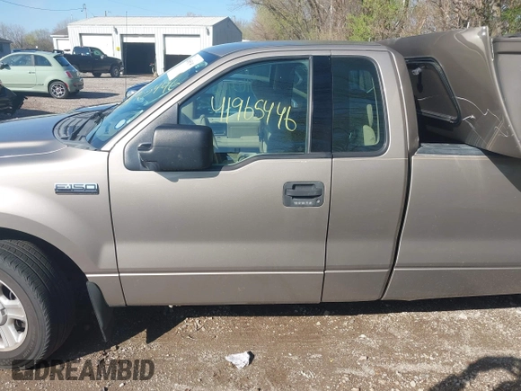 2004 Ford F-150 XL with VIN 1FTRF12W94NA93705, listed as a IAAI auction lot 41965446 with 209,097 mi miles. Bid and sale history available at carsss.com. Image 14.