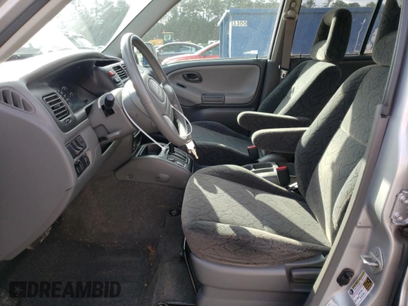 2004 Chevrolet Tracker LT z VIN 2CNBE634346901609, wystawiony jako Copart lot #86977504 z przebiegiem 59 089 mil mil oraz Szkoda całkowita • Salvage title. Historia ofert i sprzedaży dostępna na DreamBid. Obrazek 7.