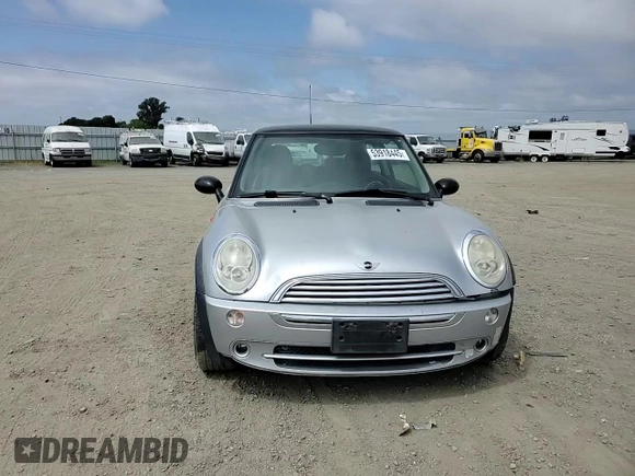 2005 MINI Hardtop with VIN WMWRC335X5TJ70165, listed as a Copart auction lot 53918445 with 145,572 mi miles and Salvage title. Bid and sale history available at DreamBid. Image 13.