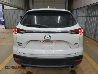 2017 Mazda CX-9 Touring z VIN JM3TCACY8H0138948, wystawiony jako Copart lot #86755594 z przebiegiem 89 828 mil mil oraz Szkoda całkowita • Salvage title. Historia ofert i sprzedaży dostępna na DreamBid. Obrazek 6.