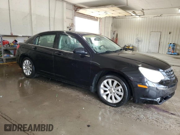 2010 Chrysler Sebring Limited with VIN 1C3CC5FB2AN229671, listed as a Copart auction lot 62181015 with 229,390 mi miles and Salvage title. Bid and sale history available at DreamBid. Image 4.