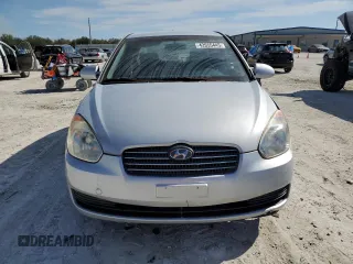 2007 Hyundai Accent GL z VIN KMHCN45C77U073194, wystawiony jako Copart lot #42955445 z przebiegiem 248 364 mil mil oraz Nie do naprawy • Non repairable. Historia ofert i sprzedaży dostępna na DreamBid. Obrazek 5.