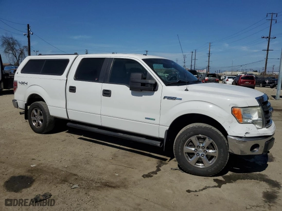 2014 Ford F-150 XL with VIN 1FTFW1ETXEFB69819, listed as a Copart auction lot 47809985 with 187,732 mi miles and Salvage Title. Bid and sale history available at carsss.com. Image 4.